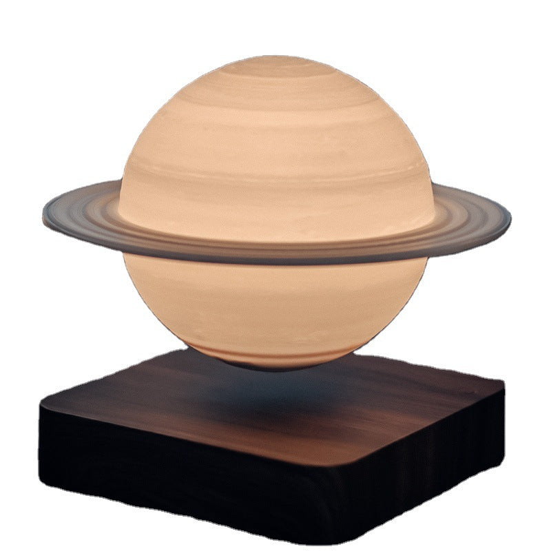 product image of saturn planet cool lamp with white background