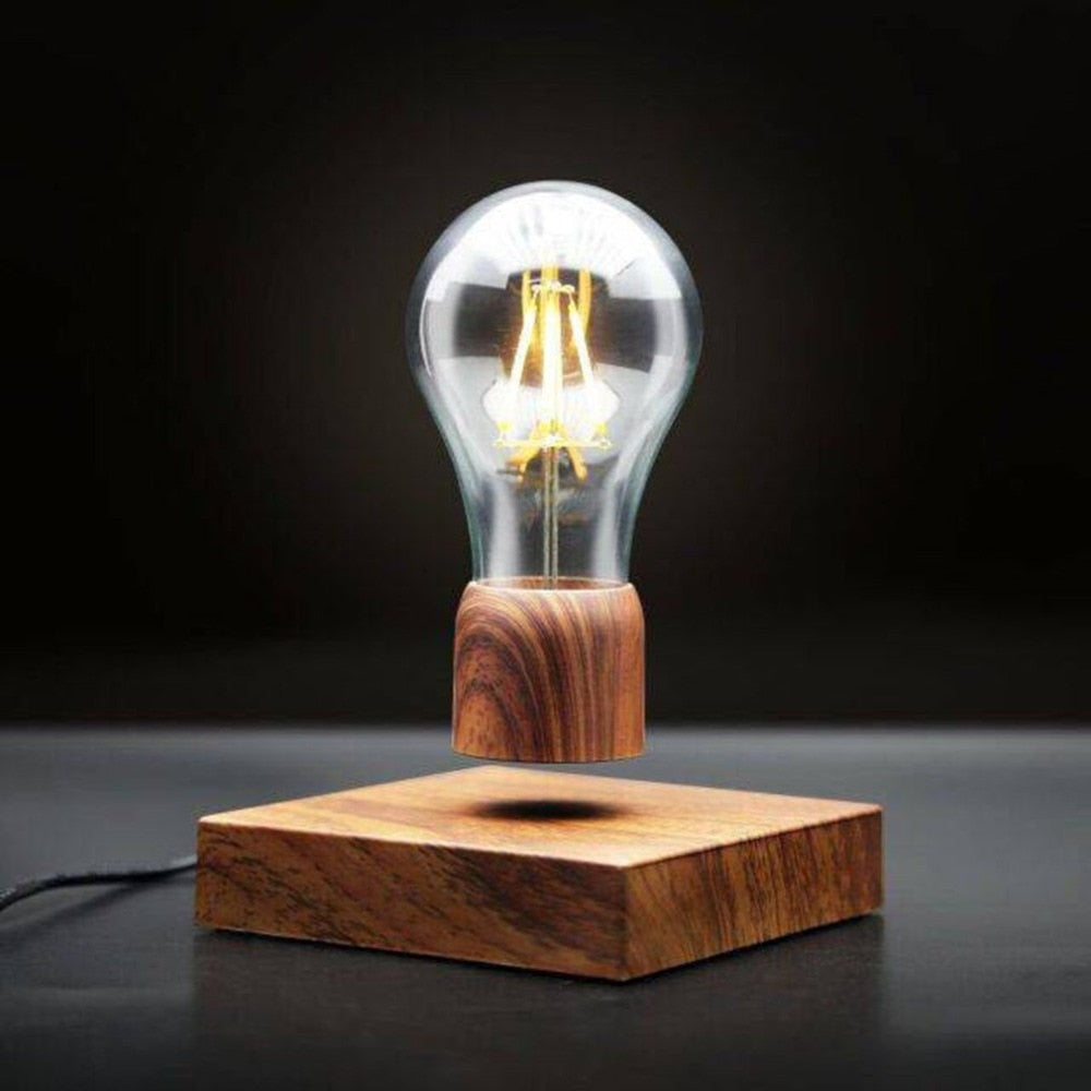 wooden, unique, cool lamp floating over a base