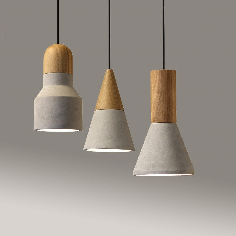 three half wood, half ceramic lamps showcasing a boho style