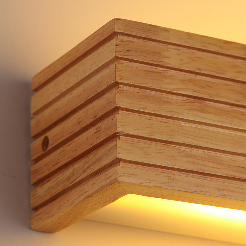 wooden wall lamp with stripes and warm light, home